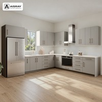 Meuble de cuisine en forme de L sur mesure, portes en thermofoil PVC de luxe, design modulaire et tiroirs à fermeture douce, structure en panneaux mélaminés