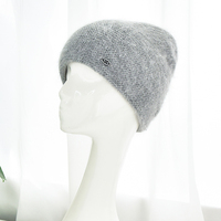 Bonnet d'hiver en laine à cheveux longs angora avec logo personnalisé Bonnets unis en tricot torsadé de haute qualité pour femmes
