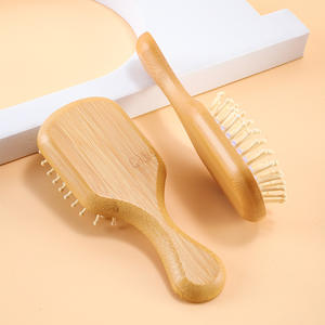 หวีไม้ไผ่แบบพกพาขนาดเล็ก คลาสสิก ป้องกันไฟฟ้าสถิตย์ สำหรับจัดแต่งทรงผมและดัดผมที่บ้าน พร้อมดีไซน์นวดเส้นลมปราณ - Product Image 4