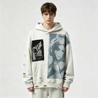 Sweat-shirt à capuche oversize streetwear avec impression artistique Kornit DTG, détail patchwork, effet vintage déchiré