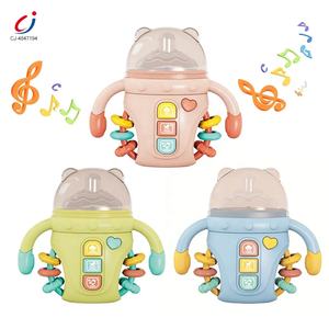 Chengji nouveau-né biberon Puzzle musique éducative sensorielle anneau de dentition apaisant et hochet bouteille de lait - Product Image 1