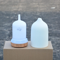 Meilleure vente bon prix Diffuseur d'arômes électronique à ultrasons en céramique à grain de bois avec pierre de parfum et veilleuse à DEL de 7 couleurs
