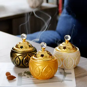 Quemador de incienso de escritorio de Oriente Medio árabe elegante oro europeo combinación de resina de metal quemador de incienso