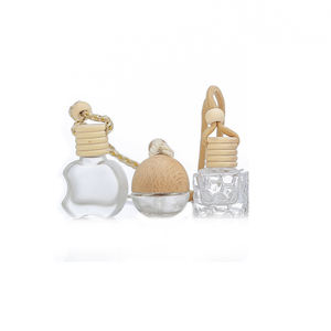 Bottiglie <span class=keywords><strong>di</strong></span> vendita calda che appendono contenitori <span class=keywords><strong>di</strong></span> tappi <span class=keywords><strong>di</strong></span> bambù <span class=keywords><strong>di</strong></span> vetro della fiala del diffusore <span class=keywords><strong>di</strong></span> oli essenziali trasparenti profumati per auto in legno con disegno - Product Image 3