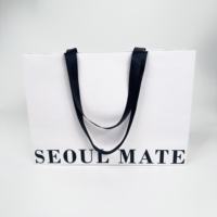 Bestseller Individuell Bedruckte Beschichtete Papier-Einkaufstasche mit Integriertem Griff für Kleidung, Schuhe und Einzelhandelsverpackungen