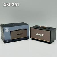 Nouveau haut-parleur portable d'extérieur en bois XM301 Retro 5.0 avec subwoofer 10W, radio FM intégrée et batterie, design compact