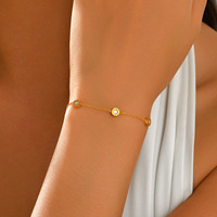 Bracelet ajustable en acier inoxydable plaqué or pour femme, avec perles incrustées de coquillages noirs et blancs double face et chiffres romains, vente en gros