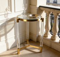 Table basse moderne personnalisée en acrylique ronde avec base en laiton doré Mobilier de salon de luxe pour usage domestique