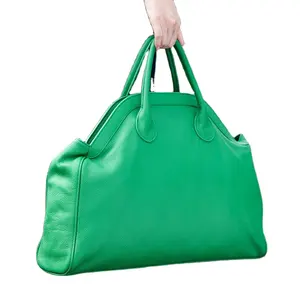 Kadınlar için lüks kadın dev çanta hakiki leatherwomen seyahat konfeksiyon silindir çanta inek derisi deri büyük çanta