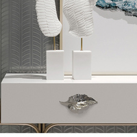 Poignée de meuble en alliage de zinc de style européen moderne en forme de feuille en argent ou or brillant pour armoires de cuisine et tiroirs