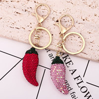 Porte-clés mignon en forme de piment en strass, pendentif pavé de cristaux, fermoir mousqueton doré, breloque de sac