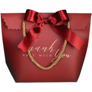 Custom Logo Wedding Favors Chocolate Party Supplies Giveaway Storage Candy Box Bowknot Wedding Gift <b>Paper</b> <b>Packaging</b> Bags - Product Image 1