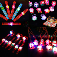 Anneau lumineux de Noël, lumière LED pour doigt, bracelet clignotant, collier, broche, cadeau pour enfants, jouet de Noël, lumière LED pour doigt