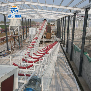 Industriële transportband met impactrollen, rubberen schijven en looprollen voor zwaar materiaal in laadzones. - Product Image 5