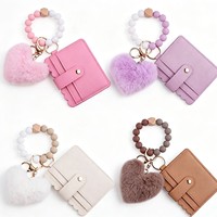 Porte-clés en cuir PU avec porte-cartes et fermoir mousqueton, motif cœur pompon en peluche et breloque boule de poils, avec portefeuille