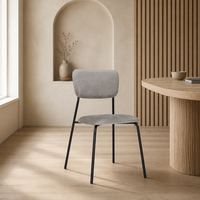 Chaise de salle à manger moderne en acier carbone noir avec assise et dossier rembourrés en velours pour hôtel et mobilier de maison