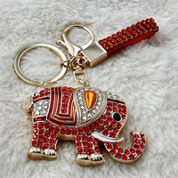 Porte-clés élégant en cristal en forme d'éléphant, bijou ethnique coloré avec diamant, cadeau idéal pour clé de voiture, sac ou accessoire de mode