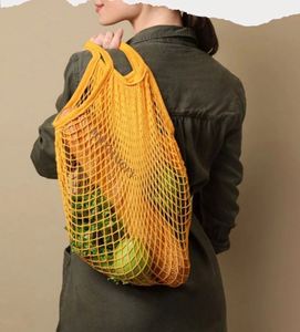 กระเป๋าผ้าตาข่ายพกพาแบบกำหนดเอง กระเป๋าช้อปปิ้งใส่ของชำนำกลับมาใช้ใหม่ได้ทันสมัย สีสันสดใส พร้อมโลโก้สั่งทำสำหรับใส่ผลไม้ - Product Image 3