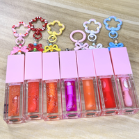 Gloss à lèvres personnalisé avec logo, breloque florale, huile à lèvres parfumée aux fruits, base transparente hydratante, fournisseur en gros