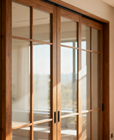 Portes coulissantes encastrées en aluminium à rupture de pont thermique, antivol et résistantes aux intempéries, de conception française Beigeman, pour l'extérieur des appartements et les chambres à coucher