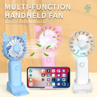 Ventilateur portable mini rafraîchissant d'été, rechargeable, en plastique, avec support de téléphone intégré