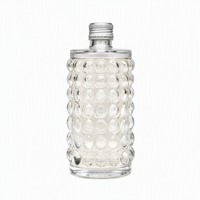 Vente en gros de flacons en verre texturé gaufré avec bouchon en liège pour parfum, huile essentielle, soins de la peau, logo personnalisé