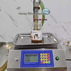 Máquina de llenado y envasado cuantitativo de pasta de sésamo, miel líquida y pasta viscosa con sistema de pesaje y silicona - Product Image 4