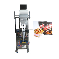 Machine d'emballage verticale pneumatique à scellage arrière grande capacité 999g en stock pour les graines de longane et de melon séchées, les pois wasabi