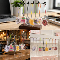 Porte-clés en plastique double face au design mignon, sans MOQ, taille mini, breloque de téléphone en acrylique avec cordons de différentes couleurs