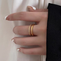Bague en acier inoxydable pour femme, style minimaliste simple, ajourée, double couche, sertie de zircons, électroplaquée, zircon synthétique haut de gamme