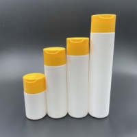 Bouteille de shampooing en plastique avec logo personnalisé 100ml 200ml 250ml 300ml Récipient HDPE mat et doux au toucher pour emballage cosmétique pour soins capillaires