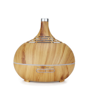 Difusor de Aroma con Diseño de Madera Calada, Humidificador de 400 ml con Luz LED y Control Remoto para Uso Doméstico - Product Image 1