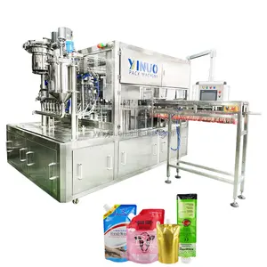 Yijianuo Machinery Rotary Milk Packing Machine Automatic Nozzle Bag Spout Pouch Liquid Filling Capping Machine
