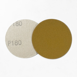 Disco de Lijado Amarillo Flocado de 4 Pulgadas P180 con Respaldo Adhesivo para Pulir Superficies de Pintura Automotriz - Product Image 1