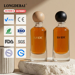 Premium Transparent Round Perfume <b>Bottle</b> 50ml Eco-friendly Clear Crimp Perfume Glass <b>Bottle</b> with Golden Black Color Wooden Lid - Product Image 1