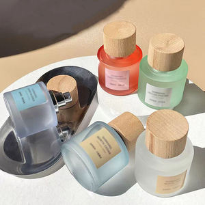 Botella de perfume personalizada transparente esmerilada redonda de gama alta 30ml 50ml 100mL Botella de perfume de lujo vacía con tapa de madera - Product Image 6