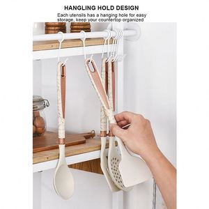 ชุดอุปกรณ์ครัวซิลิโคนกันติด 16 ชิ้น พร้อมมีดสแตนเลส ช้อน ตะหลิว และที่วาง ลดราคาพิเศษ - Product Image 5