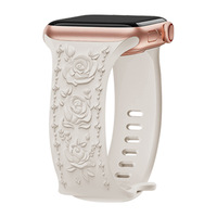 Bracelet de montre connectée en caoutchouc blanc gravé floral pour femme, design respirant avec fleurs en relief et boucle ardillon