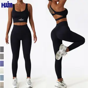 Set da donna con Logo personalizzato Yoga Fitness Wear Leggings da allenamento due pezzi da donna per abbigliamento tasche 2 pezzi reggiseno e Leggings Set da donna