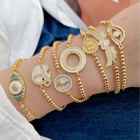 Bracelet tendance en laiton avec perles 'Ailes de cœur' plaqué or 18 carats, minimaliste, créatif, incrusté de zircon, réglable avec cordon