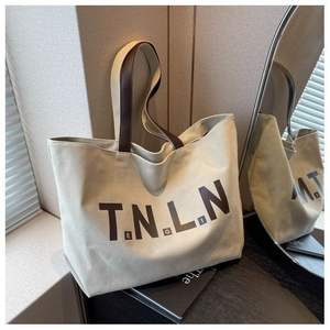 Bolso de Hombro Multifuncional Portátil con Cremallera de Lona de Poliéster Reutilizable con Estampado de Moda Casual para Estudiantes de Primera Año de Hua Cheng - Product Image 1