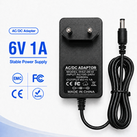 Alimentation électrique murale AC/DC personnalisable 6V 1A 6W pour routeur domestique et appareil de communication (US, EU, UK, AU)
