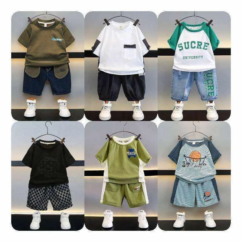 बच्चों के कपड़े 2024 लड़कों के ग्रीष्मकालीन कपड़े बड़े लड़के की छोटी आस्तीन वाली टी-शर्ट + शॉर्ट्स फैशन सूट