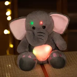 Ingrosso animale incandescente unicorno elefante luminoso morbido peluche animali LED orsacchiotto di peluche per bambini