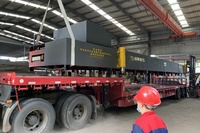 Système de chargement automatique de conteneurs pour machines lourdes et équipements industriels de grande taille, machine de manutention de conteneurs