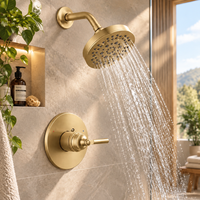 Système de douche en or brossé avec plaque frontale ronde, disque de buse noir, bras courbé, finition monocommande, vente en gros, usine OEM