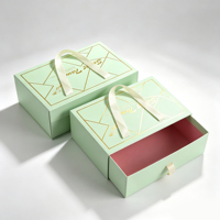 Boîtes d'emballage de luxe haut de gamme pour ensembles de soins de la peau et de beauté, minimalistes, vert menthe, rigides, avec intérieur géométrique pailleté or et rose rouge