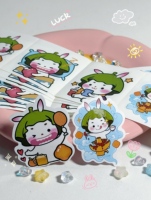 En vrac personnalisé mignon autocollant étiquette vinyle autocollant personnalisé poupée habiller jouet autocollant peut être utilisé pour faire un manuel