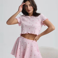 Vente en gros de pyjamas pour femmes en tissu extensible russe à volants, nouveau modèle Mujer, vêtements de maison, ensemble deux pièces à manches courtes avec bordure en forme de petit cœur, vêtements de détente