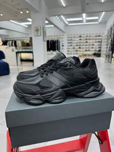 รองเท้าวิ่งลำลองสไตล์เรโทร NB 9060 สีดำล้วนสำหรับผู้ชาย รองเท้าเดินแฟชั่นสำหรับผู้หญิง คุณภาพสูง ผลิตตามแบบ OEM - Product Image 1